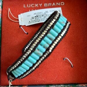 Turquoise bracelet appears to be handmade w leather and silver studs. NWT